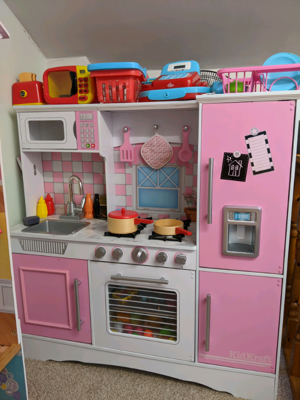 kidkraft pink wooden kitchen